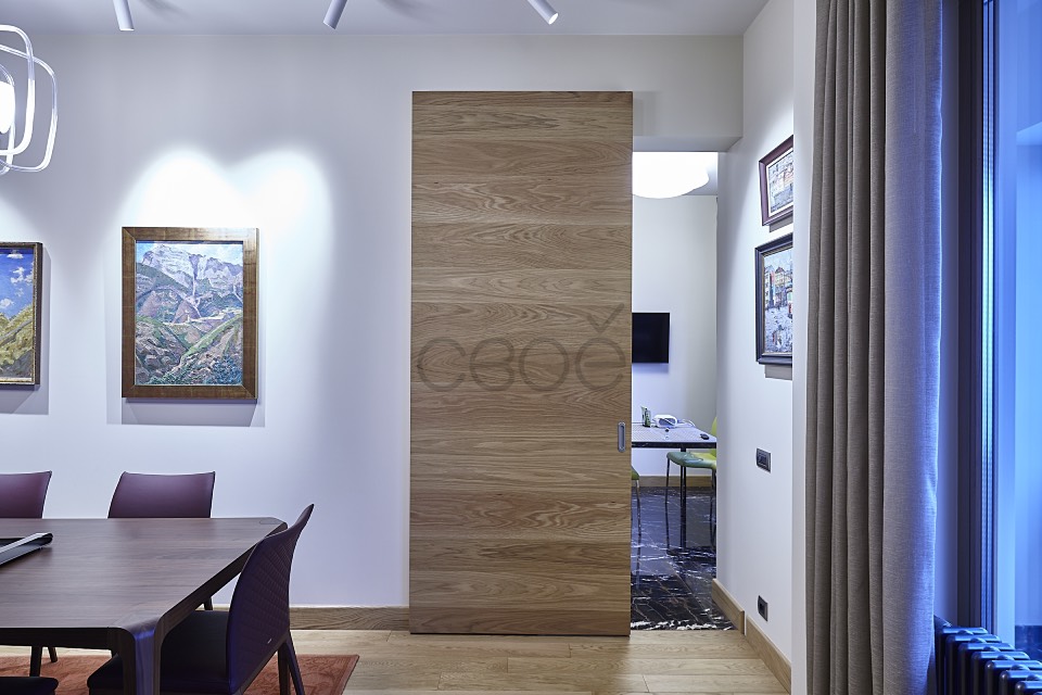 Потайная дверь в современном дизайне квартиры